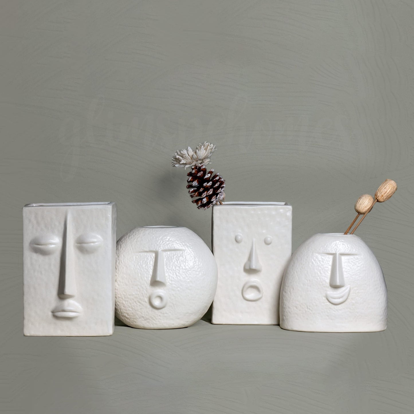 Set of four nordic face vases