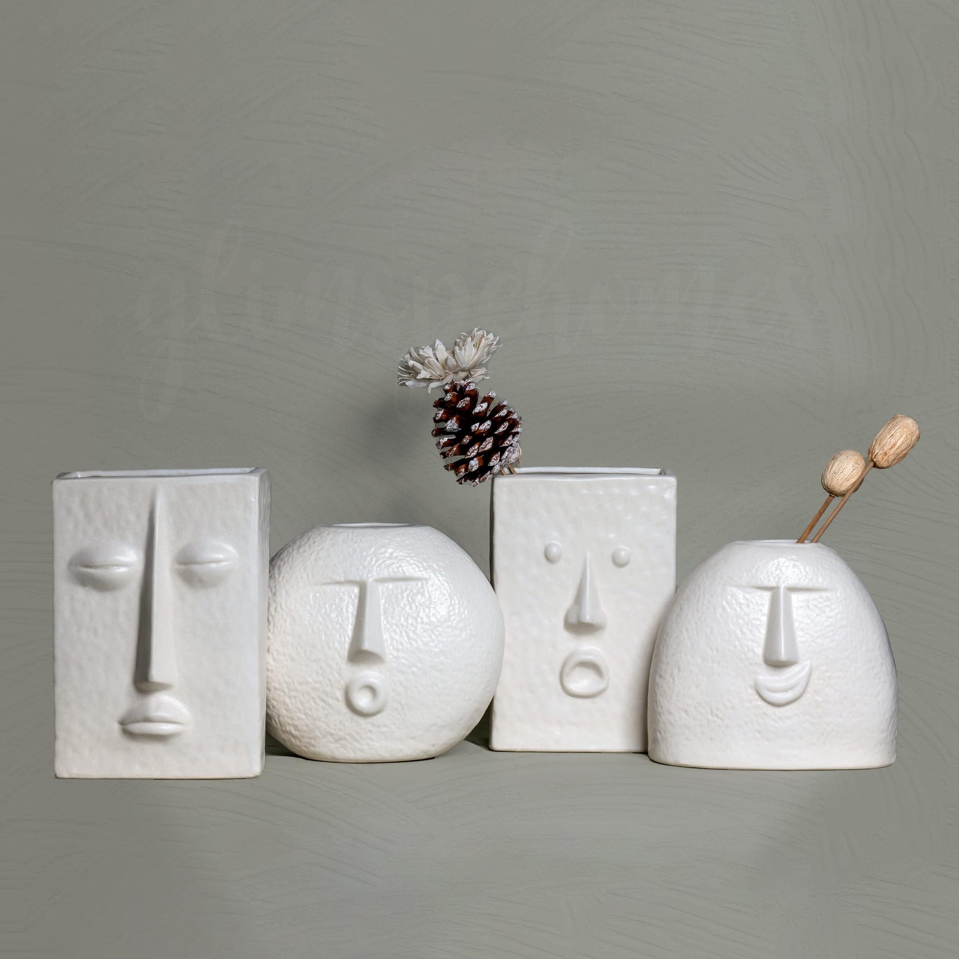 Set of four nordic face vases